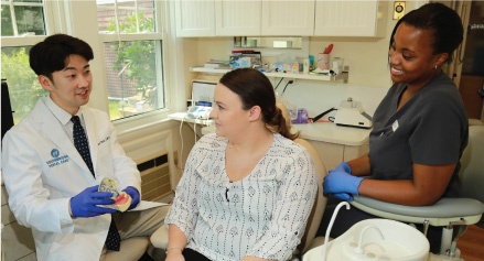 Dr. Park talking with a patient